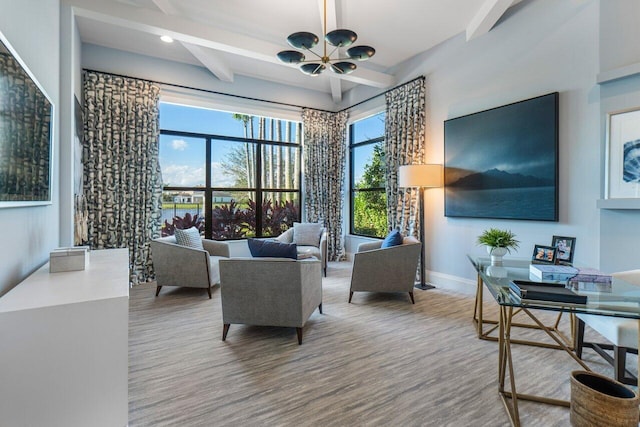 living room featuring beam ceiling, a chandelier, and hardwood / wood-style flooring