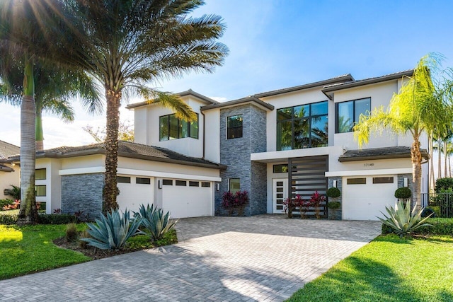 view of front of property with a garage