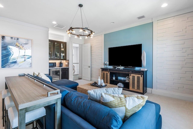 carpeted living room featuring indoor bar and wine cooler