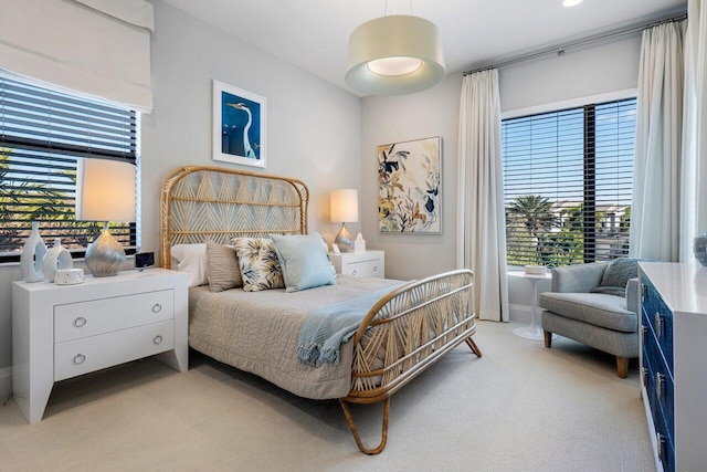 bedroom with light colored carpet