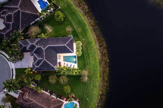 drone / aerial view with a water view