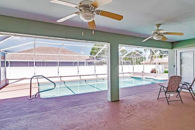 view of pool featuring ceiling fan