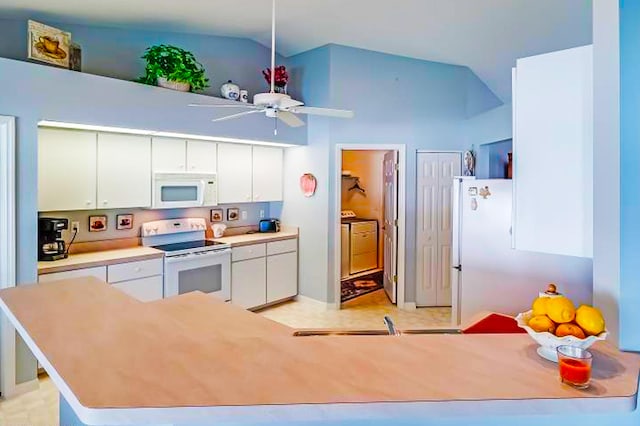 kitchen featuring separate washer and dryer, white cabinets, ceiling fan, kitchen peninsula, and white appliances