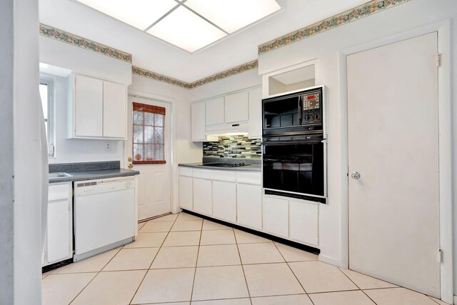 kitchen with white cabinetry, tasteful backsplash, black appliances, and light tile patterned flooring