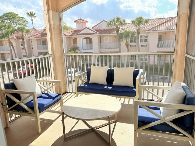 balcony featuring a residential view