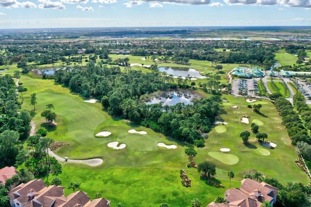 bird's eye view with a water view, a residential view, and golf course view