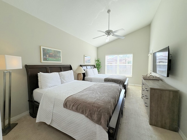 bedroom featuring vaulted ceiling, baseboards, and light colored carpet