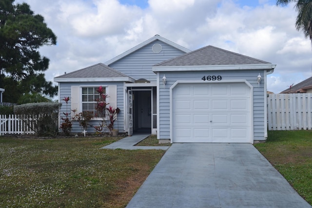 single story home with a garage and a front yard