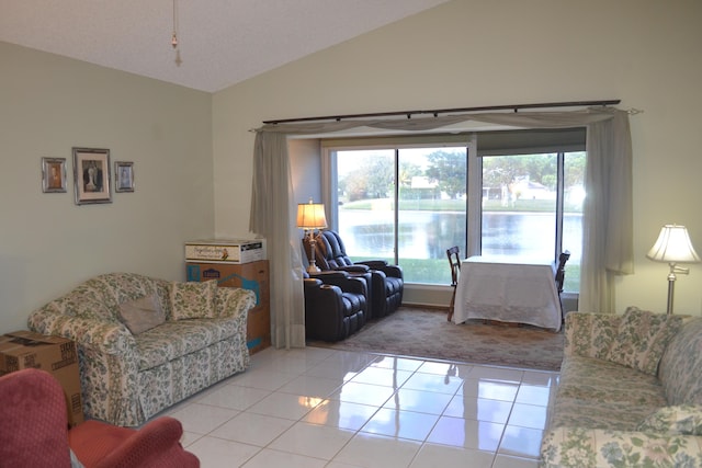 tiled living room with vaulted ceiling