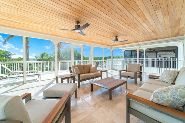 143 Pepper Ln, Jensen Beach, FL 34957 - sunroom / solarium featuring an outdoor living space, a ceiling fan, and plenty of natural light