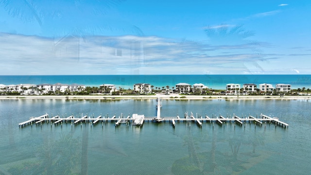 property view of water with a dock