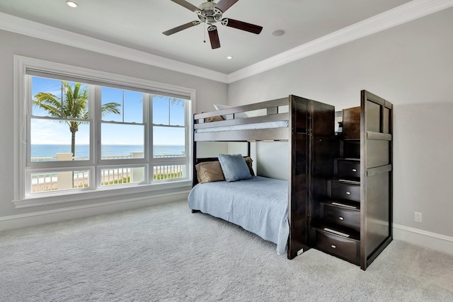 bedroom with crown molding, baseboards, carpet flooring, and recessed lighting