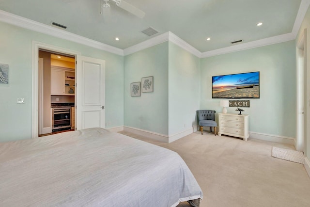 carpeted bedroom featuring crown molding, wine cooler, visible vents, and baseboards