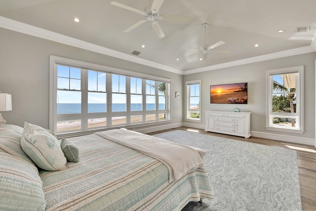 bedroom featuring ornamental molding and visible vents