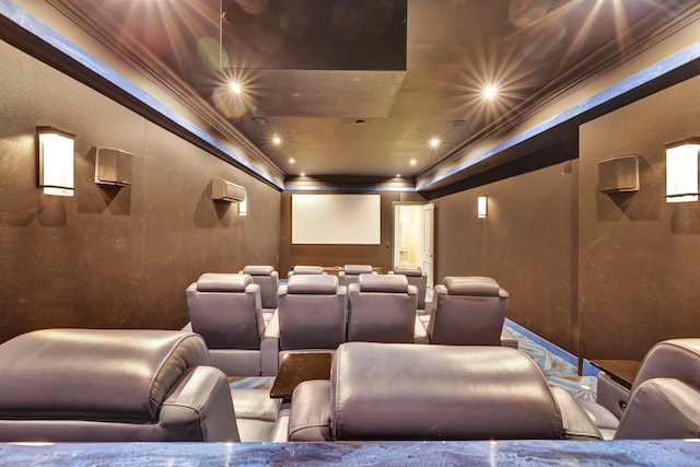 home theater featuring ornamental molding and recessed lighting