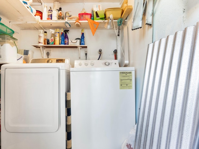 laundry room featuring washer and clothes dryer