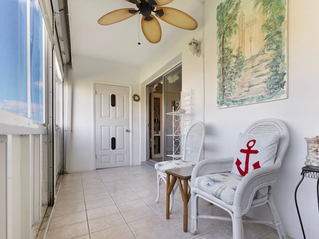 sunroom / solarium with ceiling fan