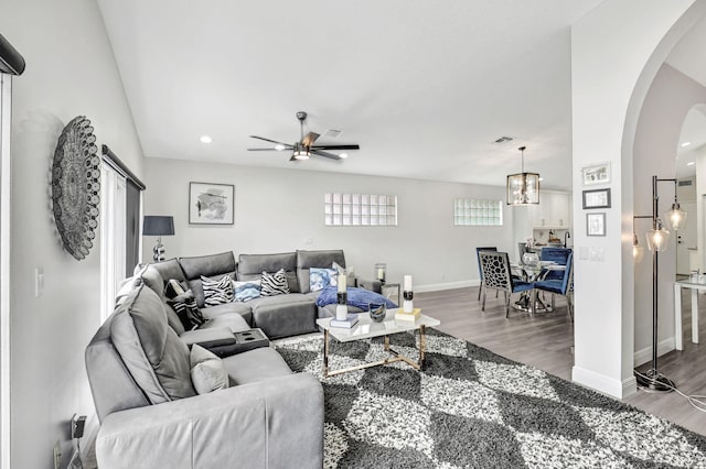 living room with ceiling fan and wood-type flooring