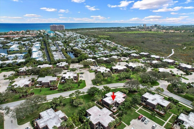 drone / aerial view with a water view