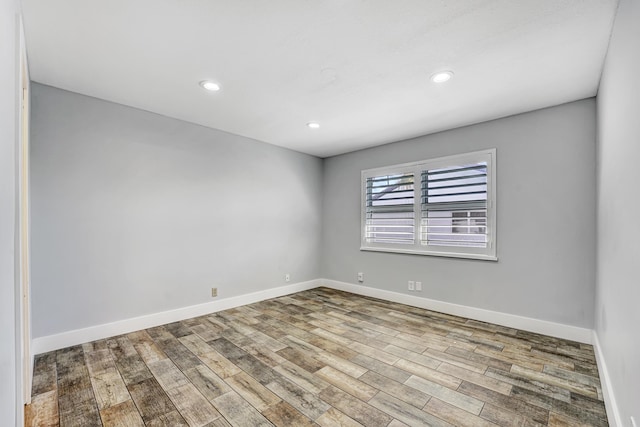 unfurnished room featuring light wood-type flooring