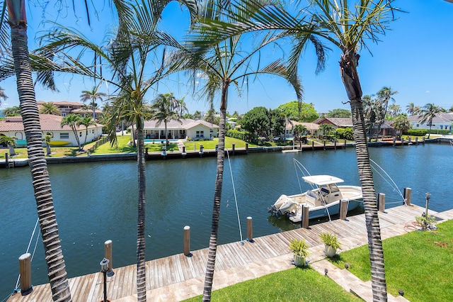 4316 S Ocean Blvd Unit 2S, Highland Beach, FL 33487 - dock area featuring a water view and a residential view