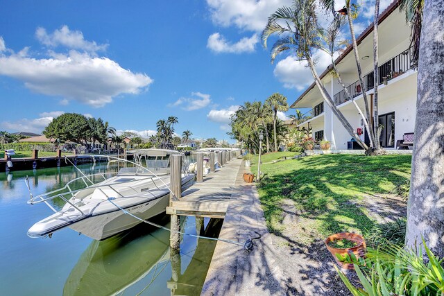 dock area with a water view