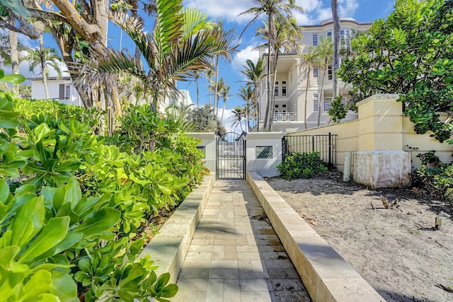 4316 S Ocean Blvd Unit 2S, Highland Beach, FL 33487 - view of yard with a gate and fence