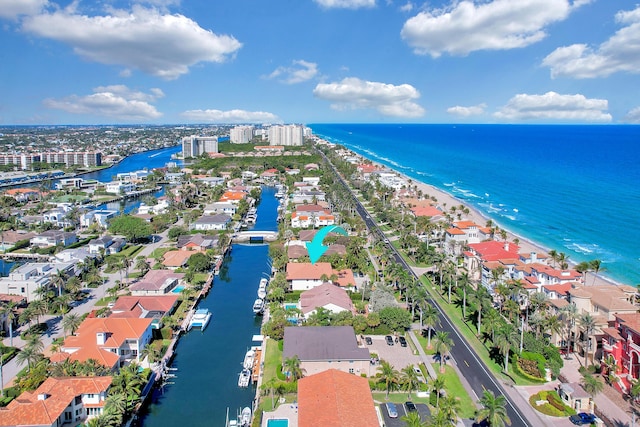 bird's eye view with a view of the beach and a water view