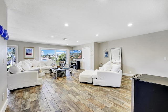 living room with light wood-type flooring