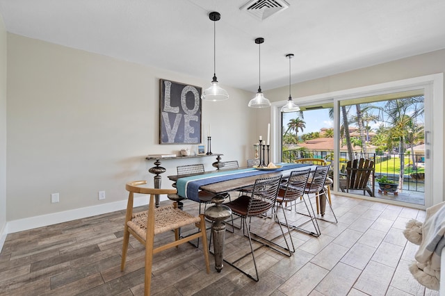 4316 S Ocean Blvd Unit 2S, Highland Beach, FL 33487 - dining area featuring light wood-style flooring and baseboards