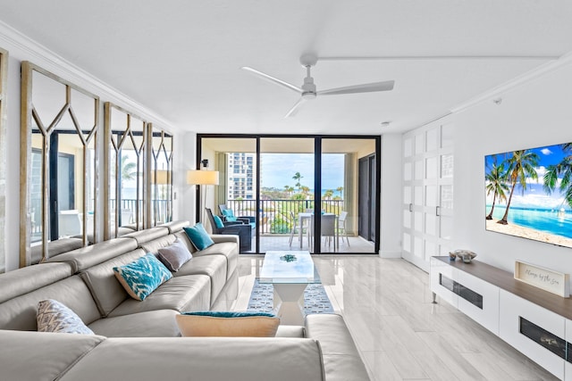 living area featuring a ceiling fan, expansive windows, and crown molding