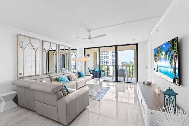 living room featuring ornamental molding, expansive windows, and ceiling fan