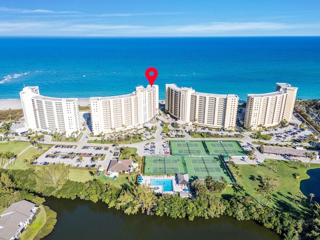 aerial view featuring a city view and a water view