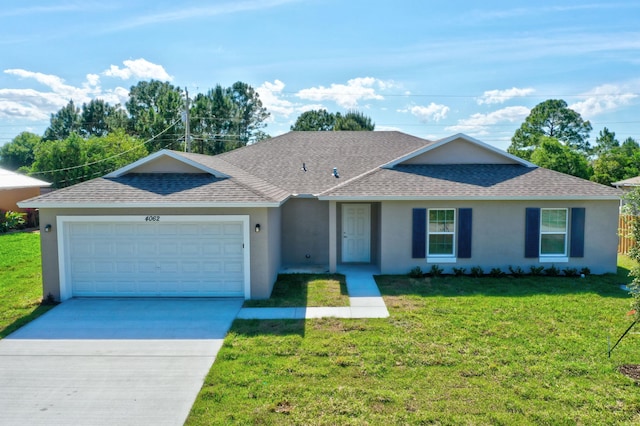 ranch-style home with a garage and a front yard