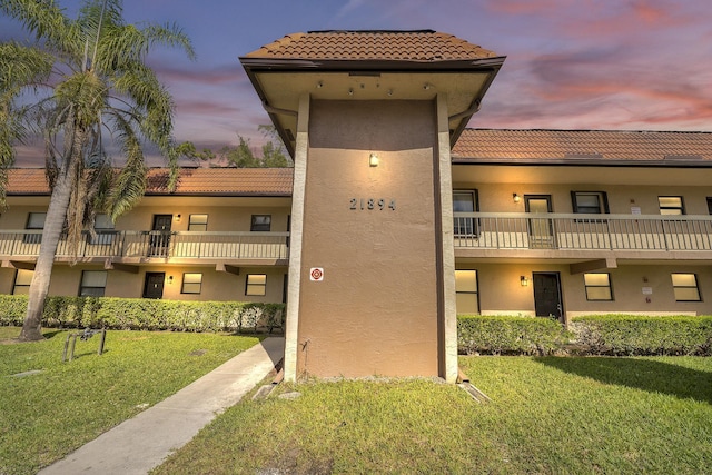 21894 Lake Forest Cir Unit 204, Boca Raton, FL 33433 - view of outdoor building at dusk
