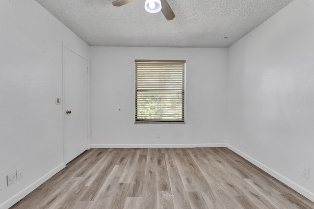 21894 Lake Forest Cir Unit 204, Boca Raton, FL 33433 - spare room with a textured ceiling, light hardwood / wood-style floors, and ceiling fan
