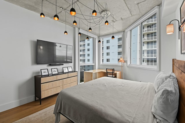 bedroom featuring wood-type flooring