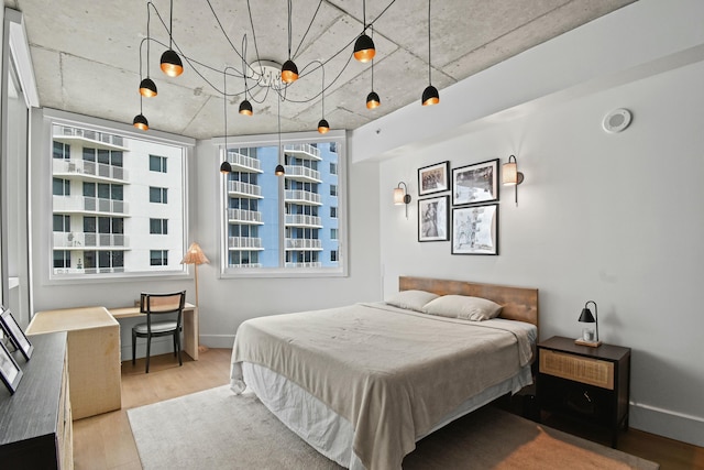 bedroom featuring light wood-type flooring