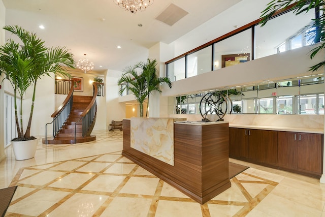 reception area featuring a chandelier