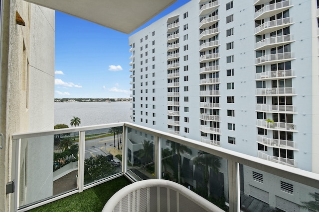 balcony featuring a water view