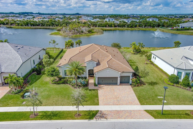 bird's eye view with a water view