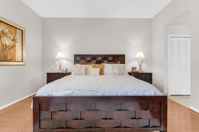 bedroom with light hardwood / wood-style floors