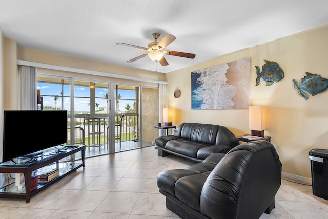 living room with ceiling fan