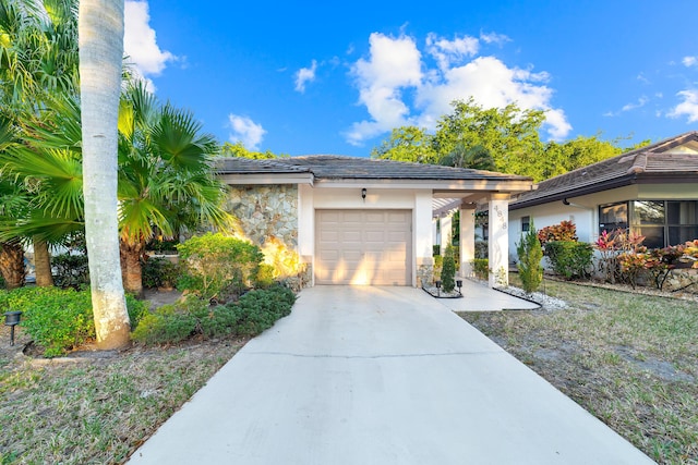 view of front of property featuring a garage