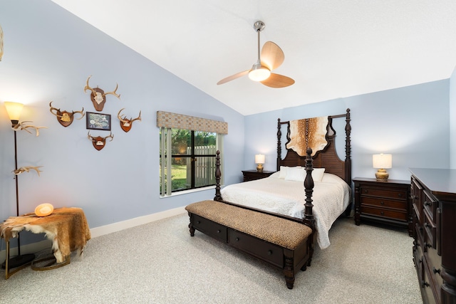 bedroom with lofted ceiling, light carpet, and ceiling fan