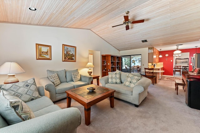 living area with visible vents, light colored carpet, lofted ceiling, ceiling fan, and wooden ceiling