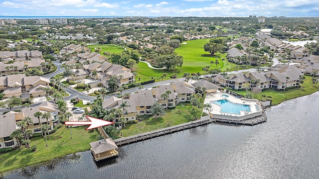 drone / aerial view with a water view