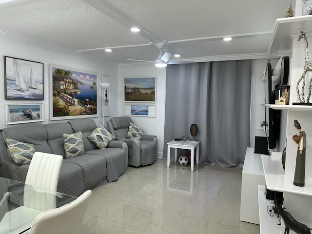 living room with ornamental molding, a textured ceiling, and ceiling fan