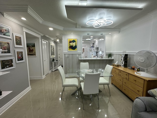 dining room with ornamental molding