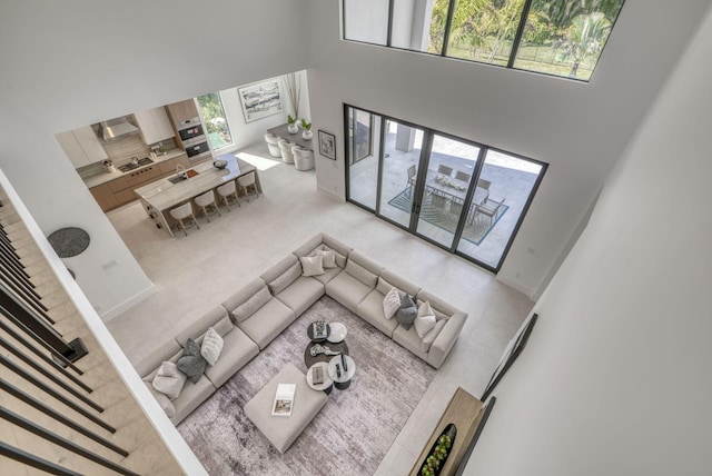 living room with a high ceiling